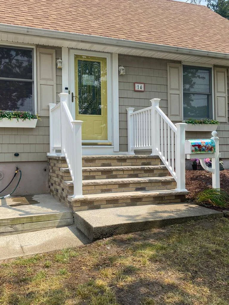 Finished front steps project by Palacios Bro Construction LLC